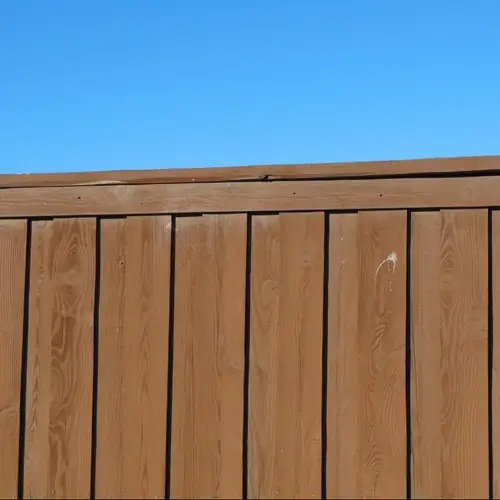Lapped timber fence