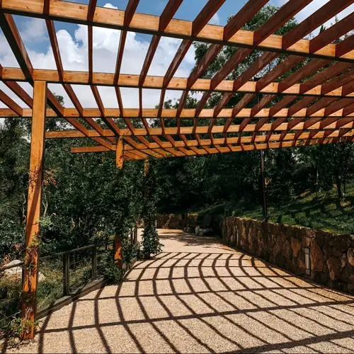 Timber pergola over a garden path