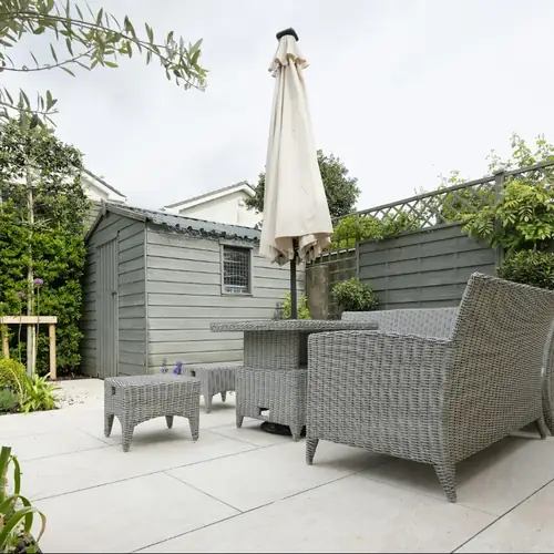 Paved courtyard with outdoor furniture